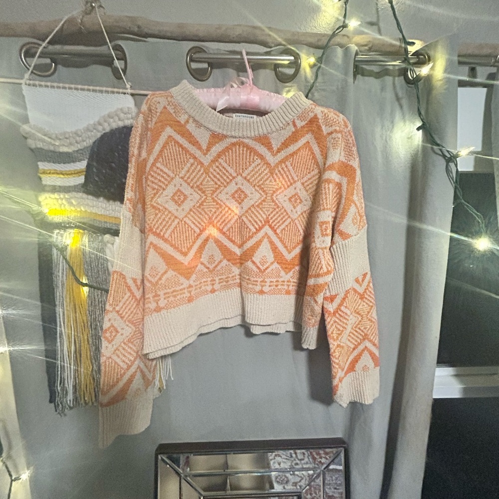 Chic Geometric Orange and Cream Sweater
